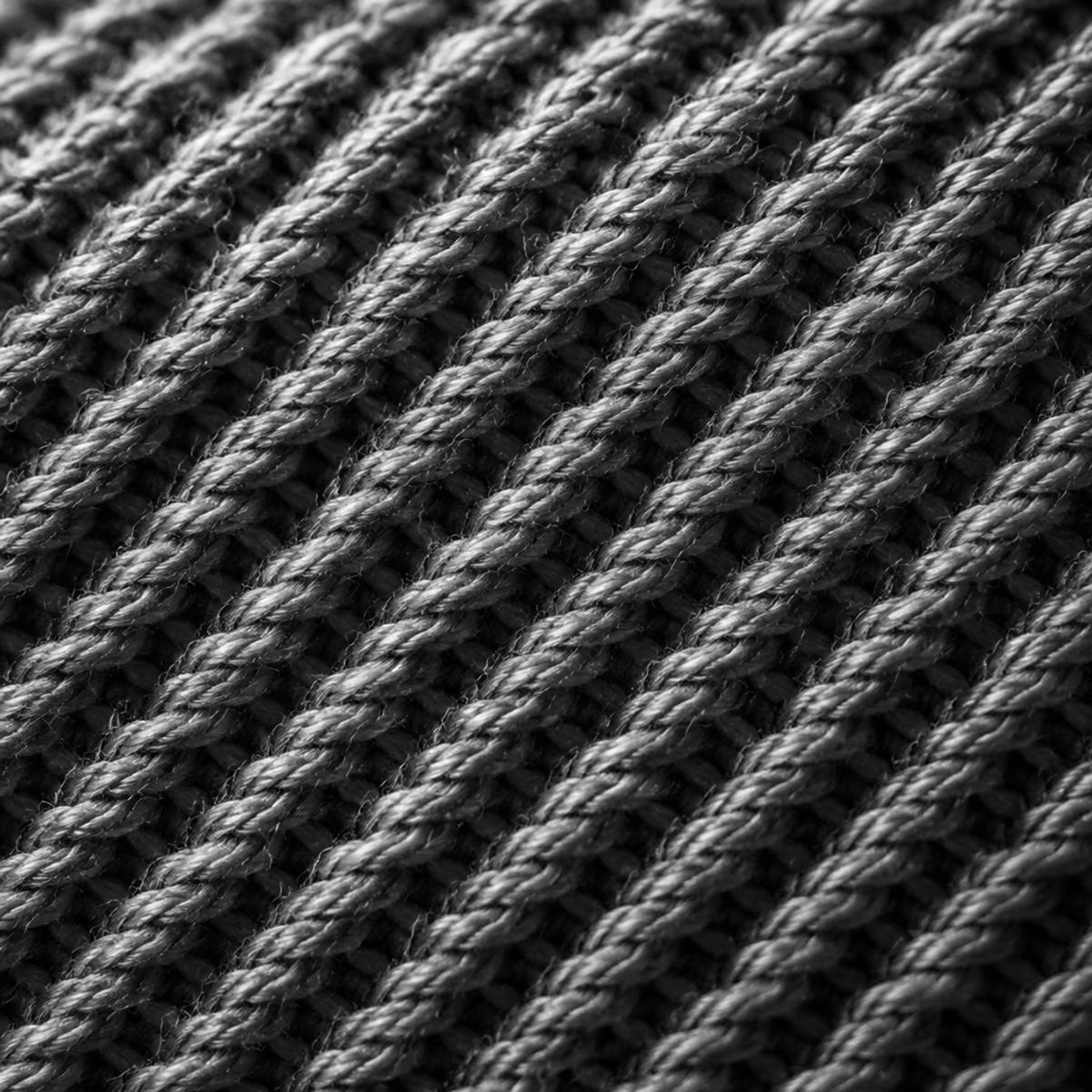 Macro in bianco e nero di una trama di tessuto twill