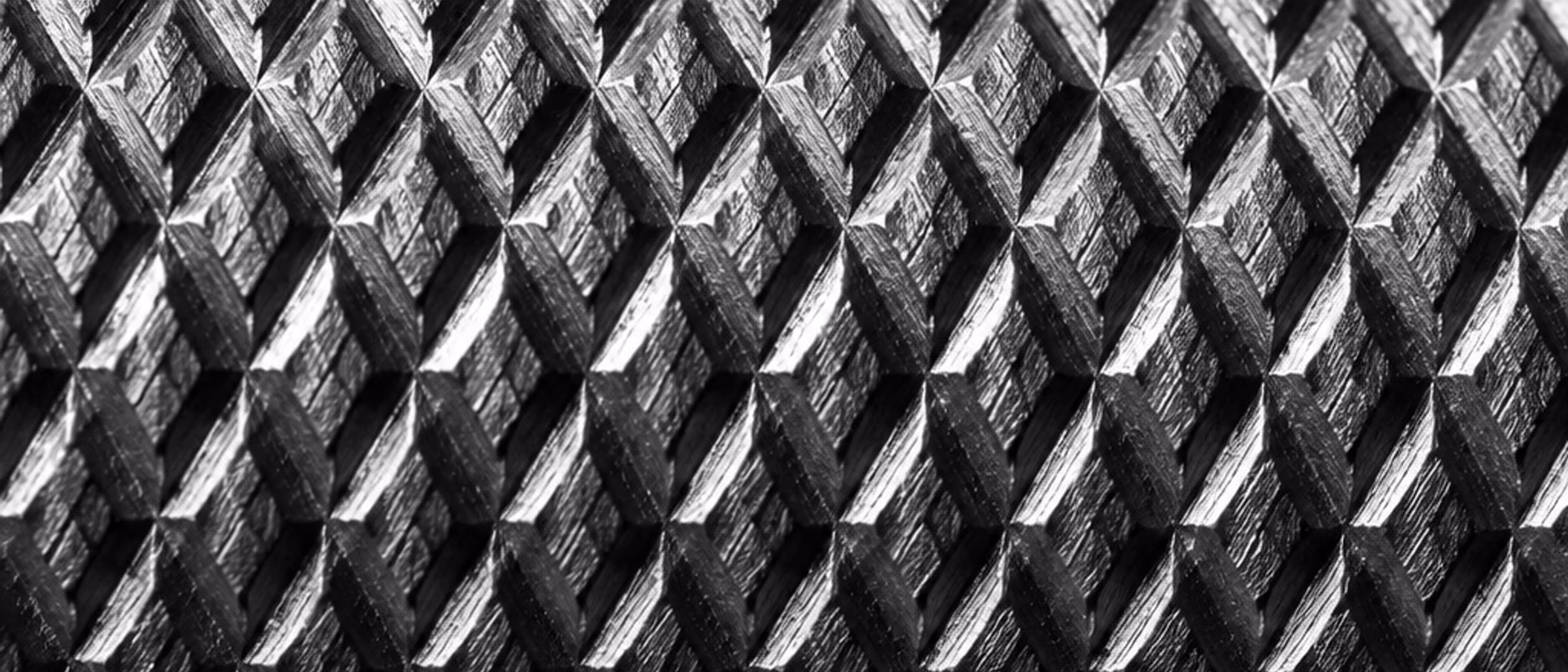 Black-and-white macro of barbell knurling